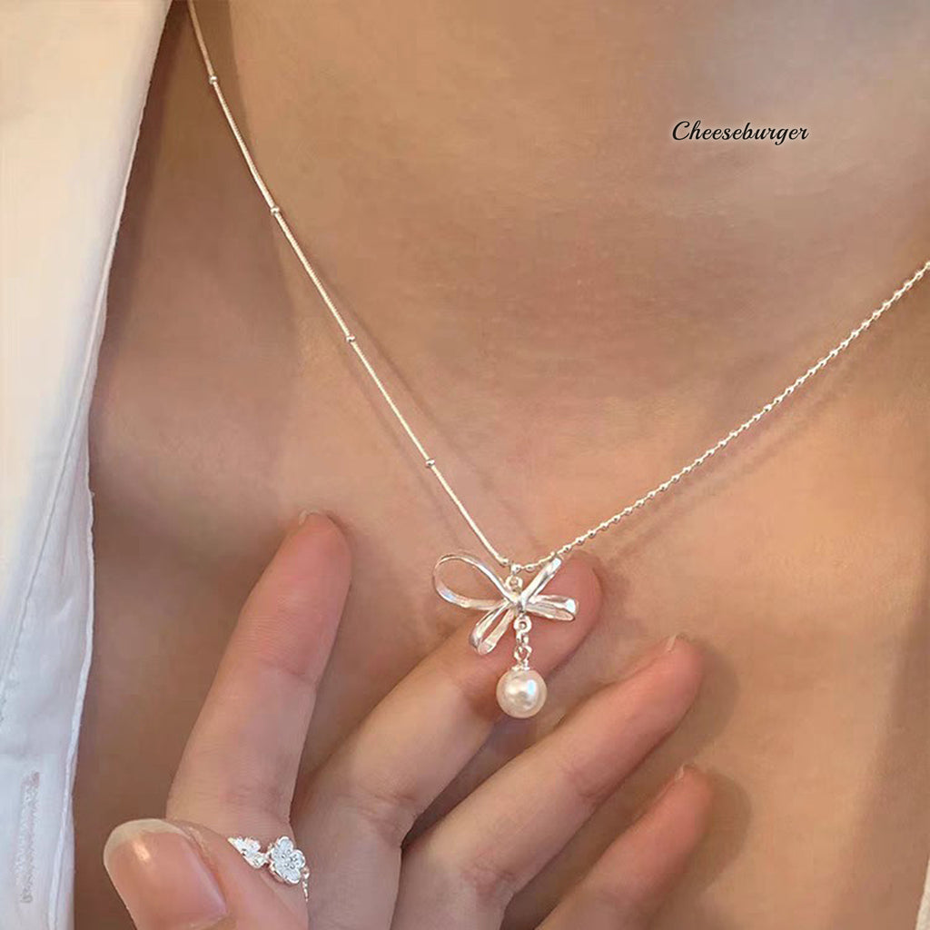 Silver Hollow Bow Pearl Pendant Necklace